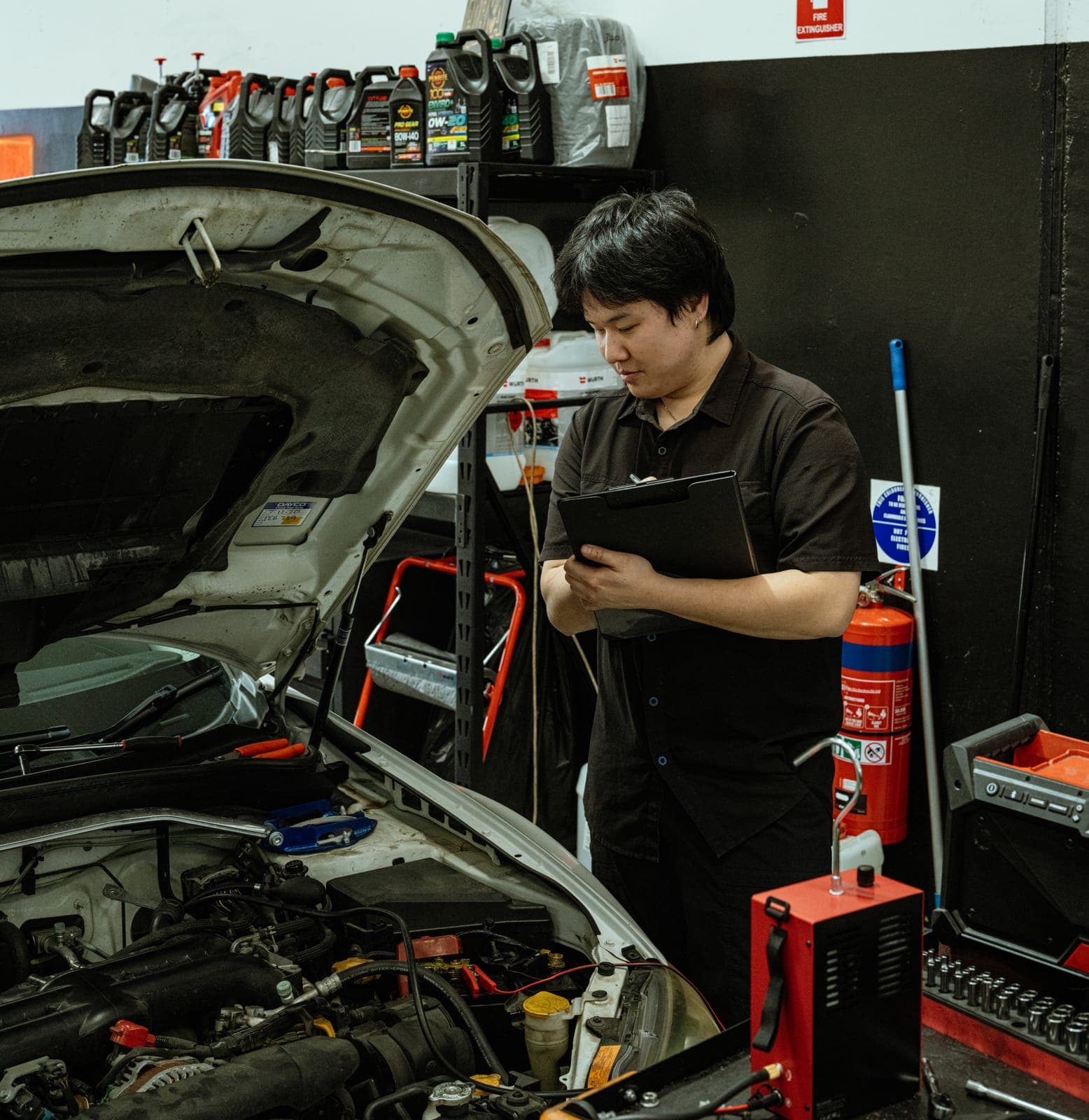 A technician at work in the Unorthodox Automotive workshop