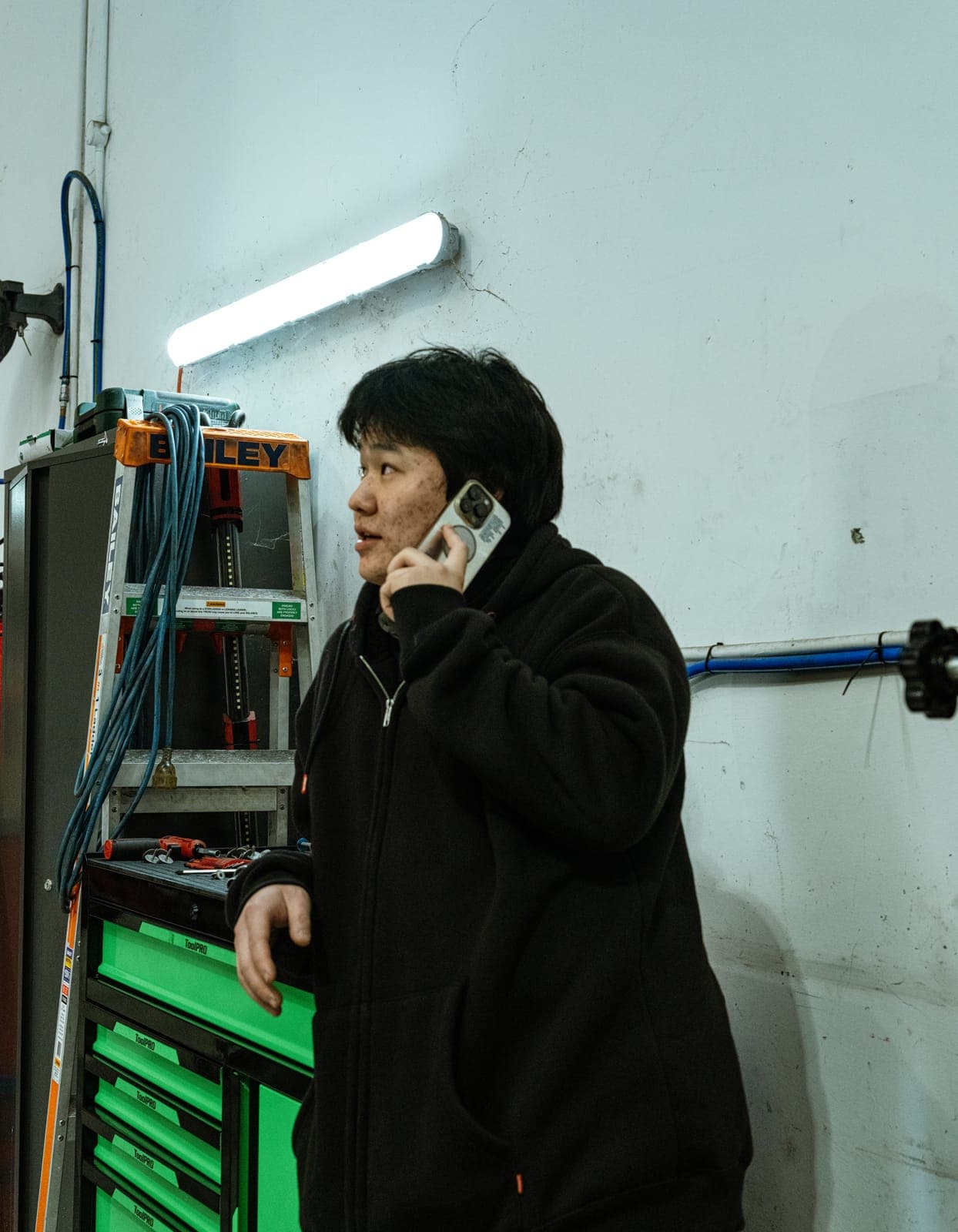 A technician at work in the Unorthodox Automotive workshop
